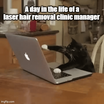 a meme with a cat typing away on a keyboard with the captions "A day in the life of a laser hair removal clinic manager"