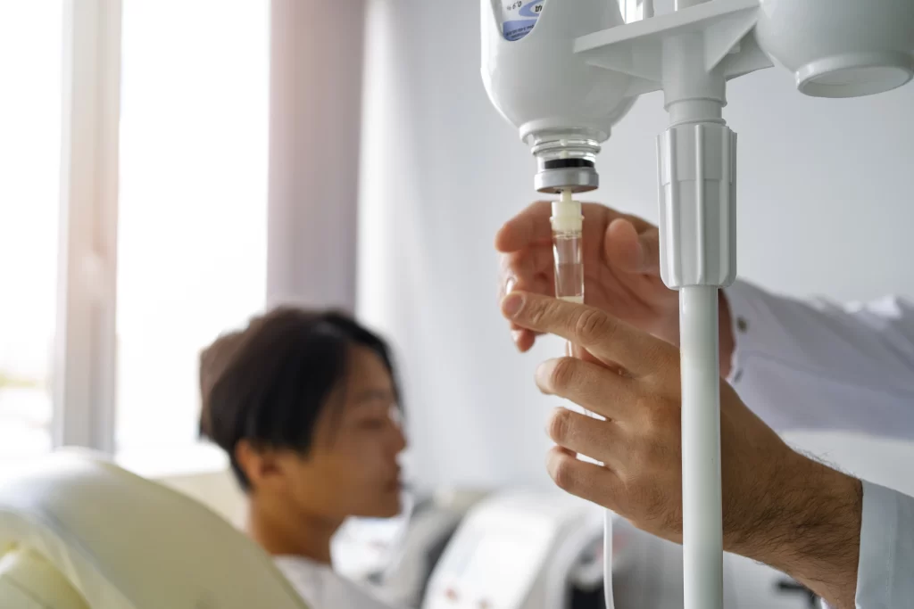 Blog cover image - patient receiving IV therapy